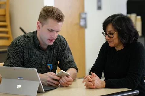 Image of technician supporting staff