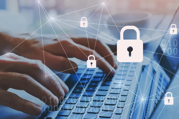 Hands typing on keyboard