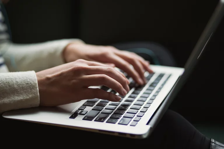 Stock image of person on computer