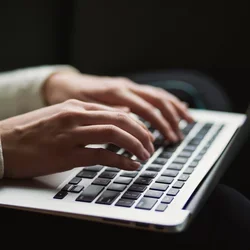 Stock image of person on computer