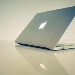 Macbook sitting on a table