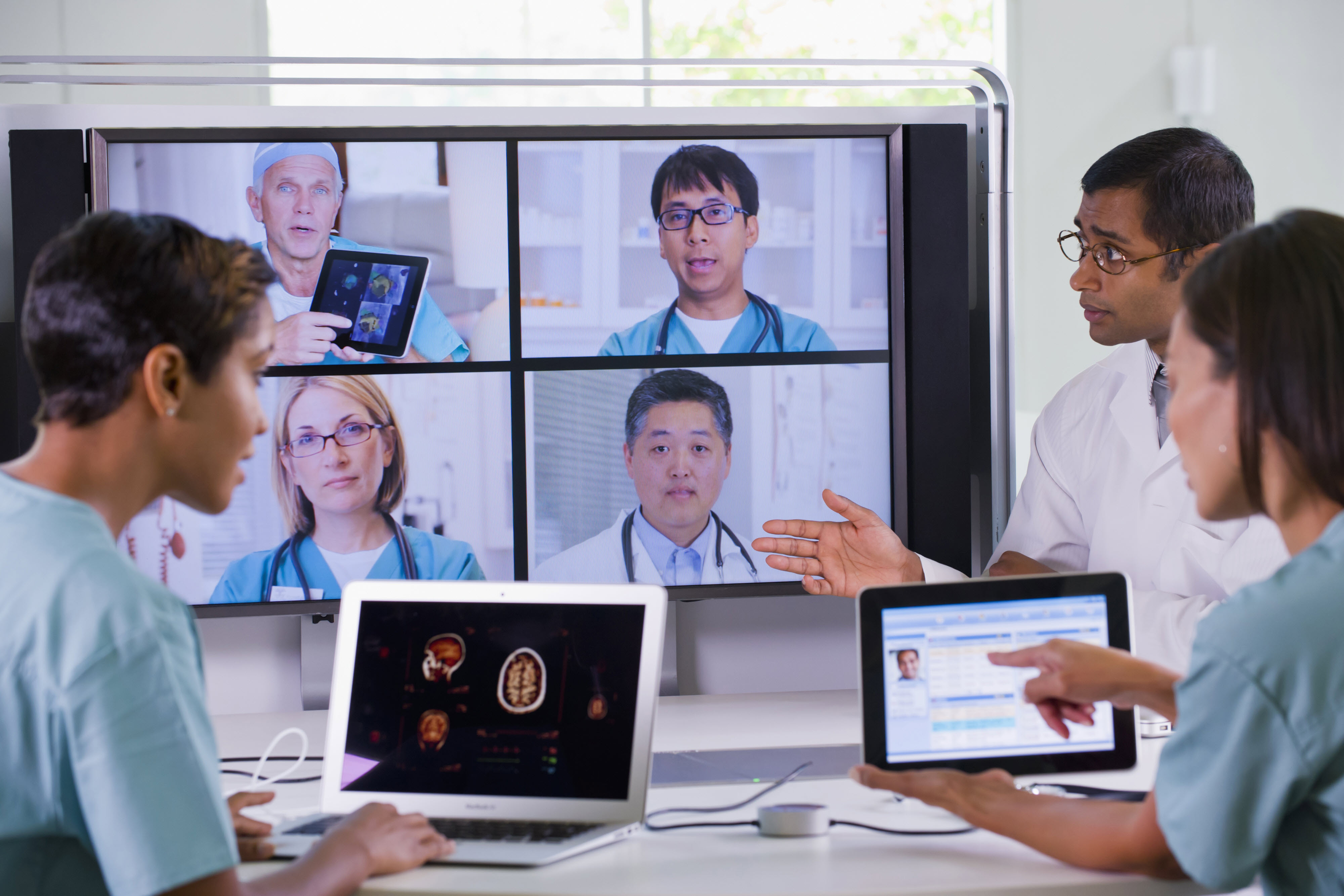 Clinicians in virtual meeting