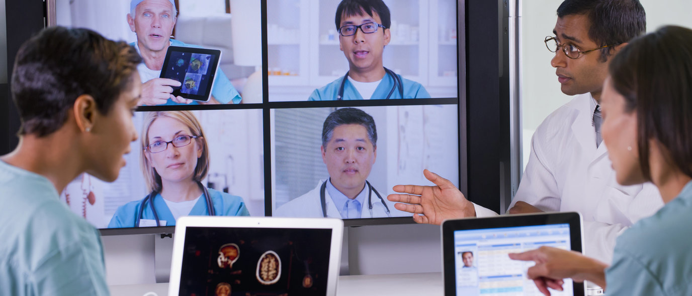 Clinicians in virtual meeting